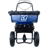 A blue Chapin ice melt spreader with a powder-coated steel frame and pneumatic tires, designed for broadcast application.