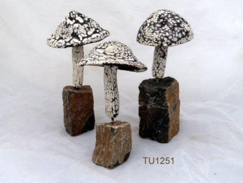 Three Ceramic mushrooms